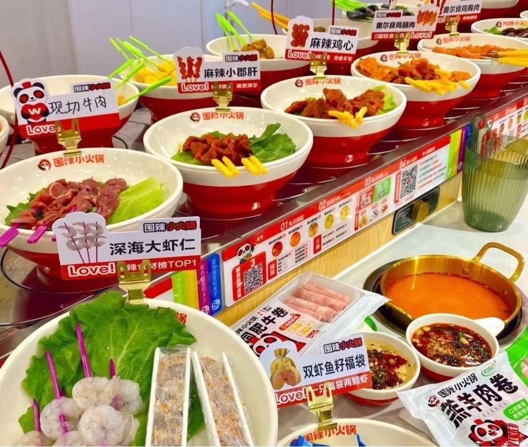 王诞生在河南｜河南餐饮 奔赴千店PG麻将胡了2中国旋转小火锅之(图2)